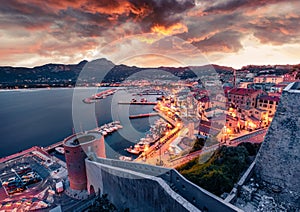 Unbelievable evening cityscape of Calvi port. Gorgeous summer sunrise on Corsica island, France, Europe. Exciting seascape of Medi