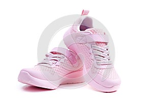 Unbranded pink running shoes on a white background photo