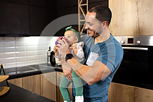 Unbreakable bond between young dad and his baby daughter