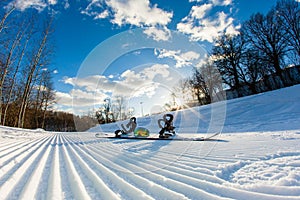 Unbroken ski slope, snowboard and goggles