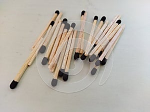 Unburnt match sticks on white background photo