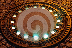 Uncanny illuminated manhole cover