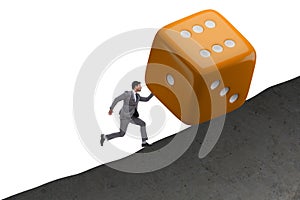 Uncertainty concept with businessman and dice