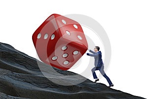 Uncertainty concept with businessman and dice