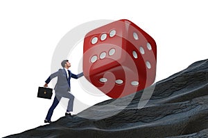 Uncertainty concept with businessman and dice