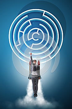 The uncertainty concept with businessman lost in maze labyrinth