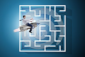 The uncertainty concept with businessman lost in maze labyrinth