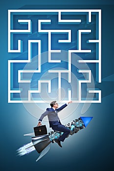 The uncertainty concept with businessman lost in maze labyrinth