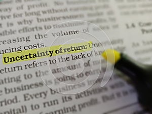 uncertainty of return business terminology displayed on project file concept