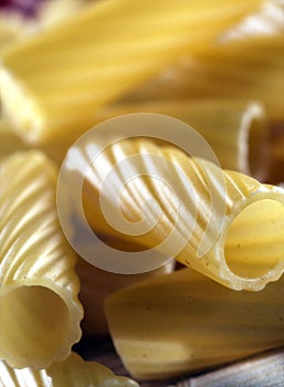 Unckoked pasta on white background photo