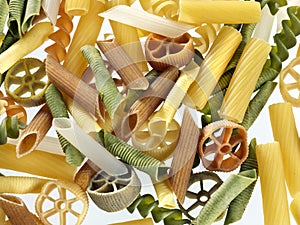 Unckoked pasta on white background photo