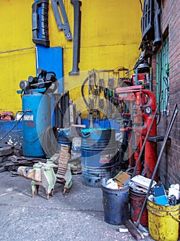 Unclean and messy corner  inside an auto repair workshop