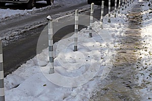 Uncleaned from snow, icy sidewalk