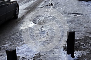 Uncleaned from snow, icy sidewalk