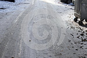 Uncleaned from snow, icy street. Slippery road in winter