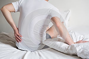 Uncomfortable mattress and pillow causes neck pain