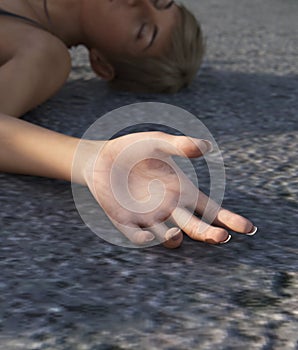 Unconscious girl on the street,concept for crime scene or book cover