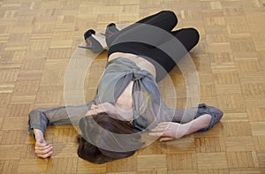Unconscious woman on the ground photo