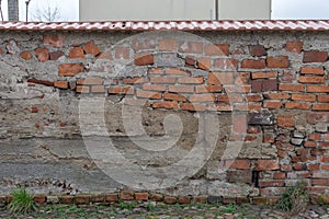 Unconventional masonry with different bricks photo