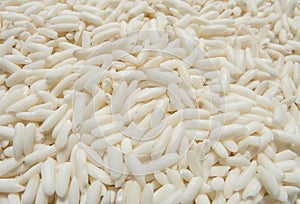 Uncook White rice seeds pattern in close up.