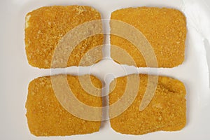 Uncooke breaded Trappist cheese