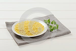 Uncooked alphabet pasta