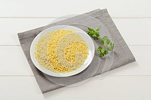 Uncooked alphabet pasta