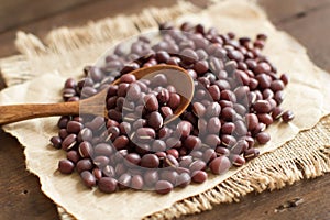 Uncooked azuki beans with a spoon