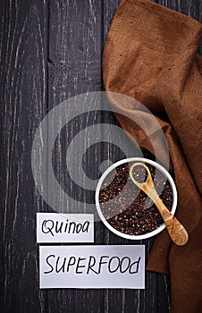 Uncooked black quinoa in bowl