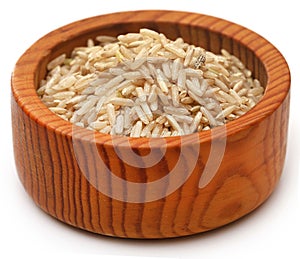 Uncooked brown rice over white