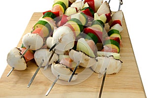 Uncooked chicken kebabs