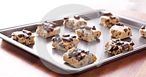 Uncooked cookie dough on a baking pan