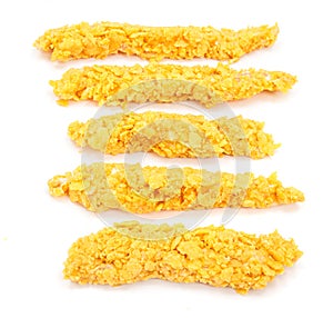 Uncooked cornflake crumbed chicken breast fillets