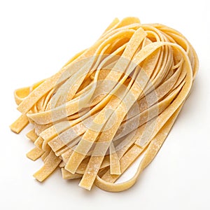 Uncooked fettuccine pasta isolated on white photo
