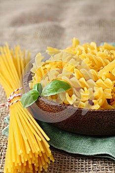 Uncooked gluten free pasta from blend of corn and rice flour