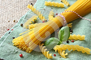 Uncooked gluten free pasta from blend of corn and rice flour