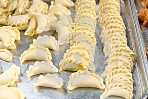 uncooked Guangdong style crispy pastry dumplings for Chinese New Year photo