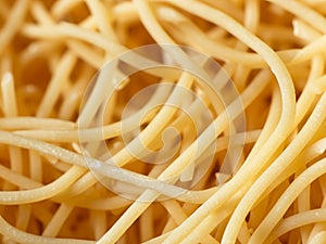 uncooked italian noodles close up background