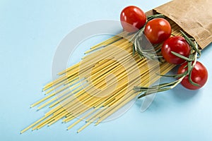 Uncooked Italian Pasta Spaghetti with Cherry Tomato and Rosemary