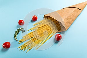 Uncooked Italian Pasta Spaghetti in a Paper Bag
