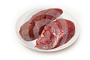 Uncooked kangaroo meat steaks