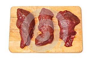 Uncooked kangaroo meat steaks