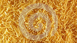Uncooked Noodles that Rotating Counterclockwise
