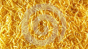 Uncooked Noodles that Slowly Rotating Counterclockwise