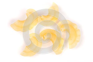 Uncooked pasta isolated on a white background closeup