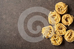 Uncooked pasta on kitchen table