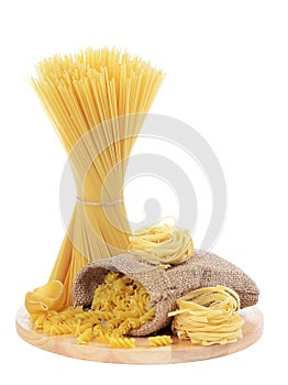 Uncooked pasta spaghetti macaroni isolated on white background