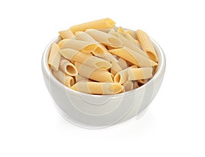 uncooked penne pasta isolated on a white