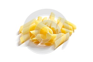 Uncooked penne rigate italian pasta, isolated on white