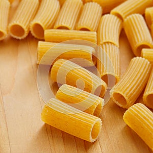 Uncooked penne rigate photo